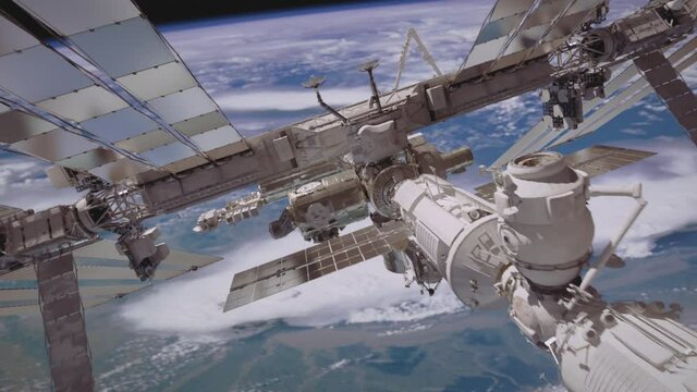 International Space Station ISS flying over earth atmosphere.