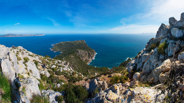 Spain, Balearic Islands, Mallorca, Peninsula Alcudia, View to Cap de Pinar, hiker between rocks