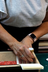 Working in a studio binding books