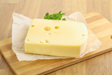 Maasdam cheese over the board