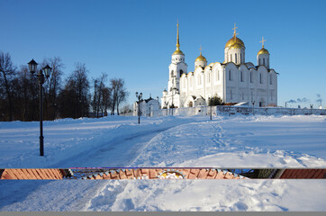 Fototapeta na wymiar Vladimir, Russia - March, 2021: Dormition Cathedral in winter sunny day