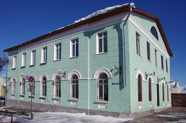Vladimir, Russia - March, 2021: Ancient city street in winter sunny day.