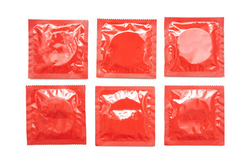 Set of six condoms in red packages isolated in white background, template