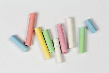 chalk pieces on white paper