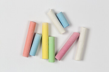 chalk pieces on white paper