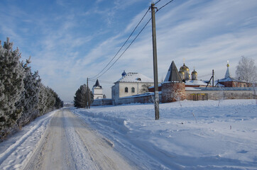 Fototapeta premium Mozhaisk, Russia - February, 2021: Luzhnetsky Ferapontovsky monastery in winter frozen day