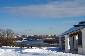 Fototapeta premium MOSCOW, RUSSIA - February, 2021: Winter day in the Kolomenskoye estate, top view to the Moscow river