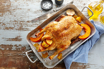 Roasted whole duck with vegetables