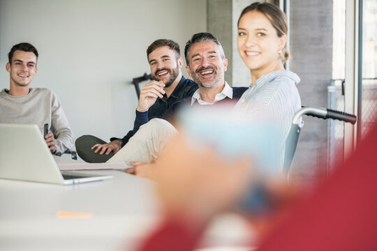 Happy business people during a meeting in office