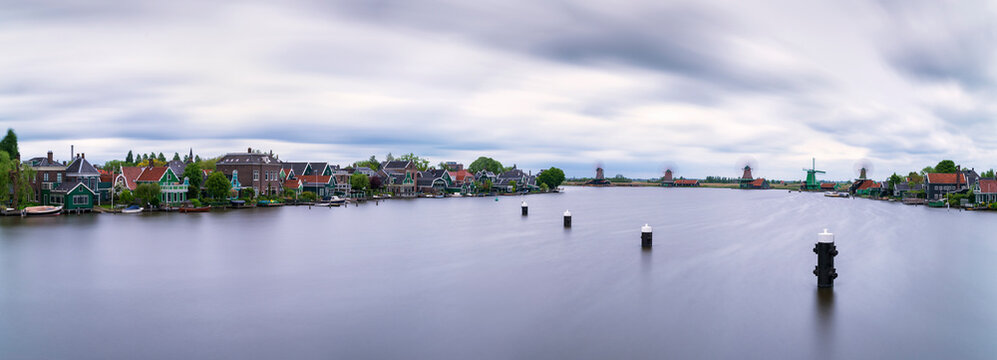 Panoramic shot of Zaan river against cloudy sky, Zaanse Schans, Zaandam, Netherlands