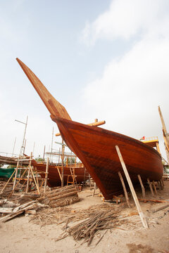 Shipyard, Boatbuilding at the beach, Sur, Oman