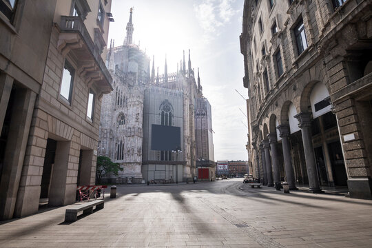 Italy, Milan, Corso Vittorio Emanuele II street with Milan Cathedral in background during COVID-19 outbreak