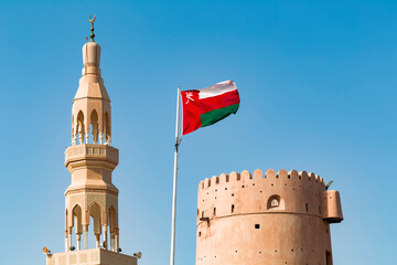 Sultanate Of Oman, Ras al Hadd, Ras al Hadd Castle with Omani flag and minaret