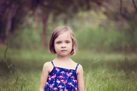 Portrait of little girl in nature