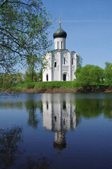 Fototapeta na wymiar Russia, Bogolyubovo - May, 2021: Church of the Intercession on the Nerl. Orthodox church and a symbol of medieval Russia, Vladimir region