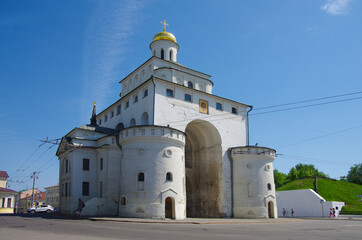 Vladimir, Russia - May, 2021:  Ancient city street in sunny day. Golden Gate