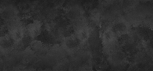 Black plaster texture. Textured concrete wall wide gloomy backdrop. Dark grey rough surface abstract grunge background