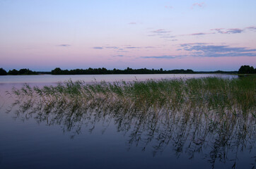Zaonezhye. Sunrise over the Kizhi island. Lake Onega
