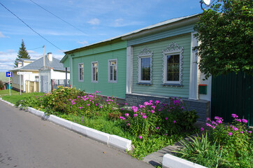 Kolomna, Russia - September, 2021: Old wooden houses on the Kremlin street of the town