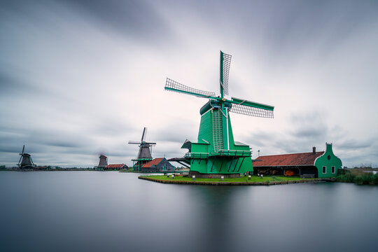 De Gekroonde Poelenburg by Zaan river against sky at Zaanse Schans, Zaandam, Netherlands