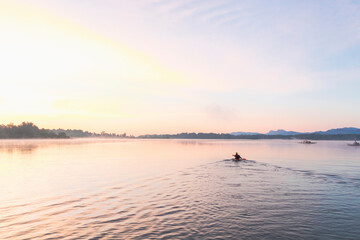 Kayaker in the morning on a lake, Germany