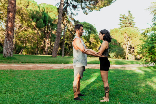 Couple doing acroyoga in park