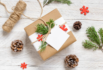 Christmas present with square blank gift tag top view, Mockup