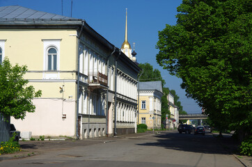 Fototapeta na wymiar Rybinsk, Russia - May, 2021: View of the street of the city. Volzhsko-Kamsky Bank, Volzhskaya embankment, 47/49. House where artist Boris Grigoriev lived