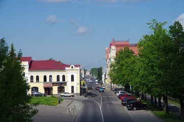 Rybinsk, Russia - May, 2021: View of the street of the city. Old hous on Volzhskaya street