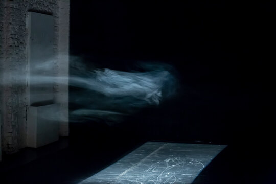 Dust cloud hovering in stage light