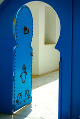 Monastir, Tunisia, Africa - August, 2012: Traditional blue metal doors in the city of Monastir