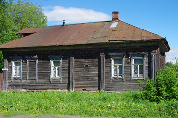 Tutaev, Russia - May, 2021: Wooden country house on city streets