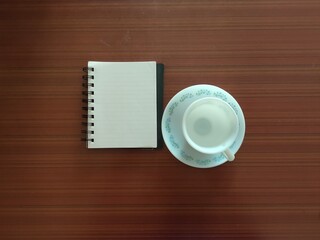 Cup saucer and a note