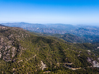 Top view on mountain range with a small hills