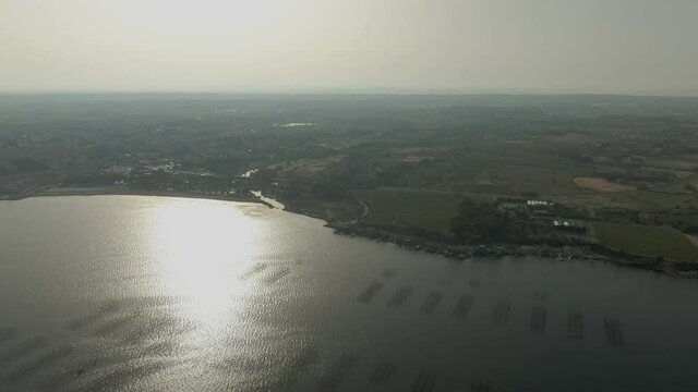 Aerial shooting of seafood oyster farms near Sete city, South France 