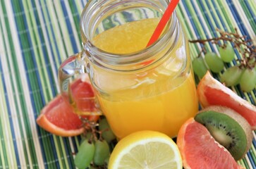 Closeup fresh juice and fruits sweet diet organic healthy citrus finness grape lemon kiwi food photos stock drinks cockail tropical raw green fruity