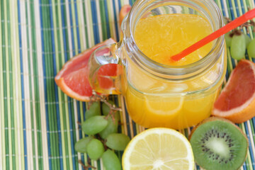 Closeup fresh juice and fruits sweet diet organic healthy citrus finness grape lemon kiwi food photos stock drinks cockail tropical raw green fruity
