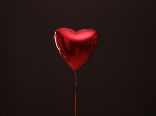Festive heart shaped balloon on dark background