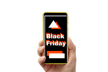 Hand holding a smartphone that on the screen announces black friday