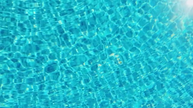 Swimming pool with crystal blue water as summer holiday and tropical paradise vacation at poolside b-roll background. High quality 4k footage