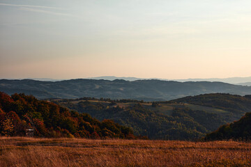Fototapeta premium View of countryside hilly landscape in autumn colors.
