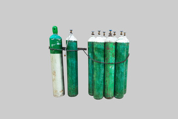 Green and scratches oxigen tanks tied with chains