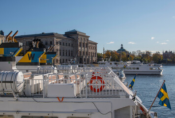 The museum National museum at a pier with commuting boats a color full autumn day