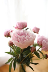 pink peonies in vase