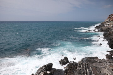 waves crashing on rocks