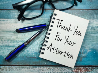 Notebook,pen,glasses and word Thank You For Your Attention