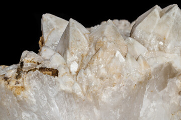 Macro mineral stone Snow quartz with calcite on a black background