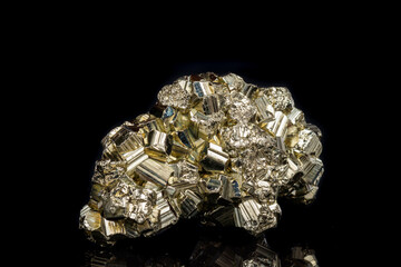Macro mineral stone Pyrite on a black background