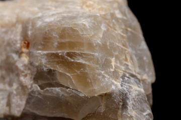 Macro mineral stone Moonstone a black background