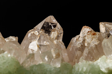 Macro mineral stone Prehnite quartz on a black background